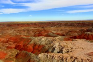 A stunning view of the Painted Desert's vibrant red and orange hues at Petrified Forest National Park, Arizona.